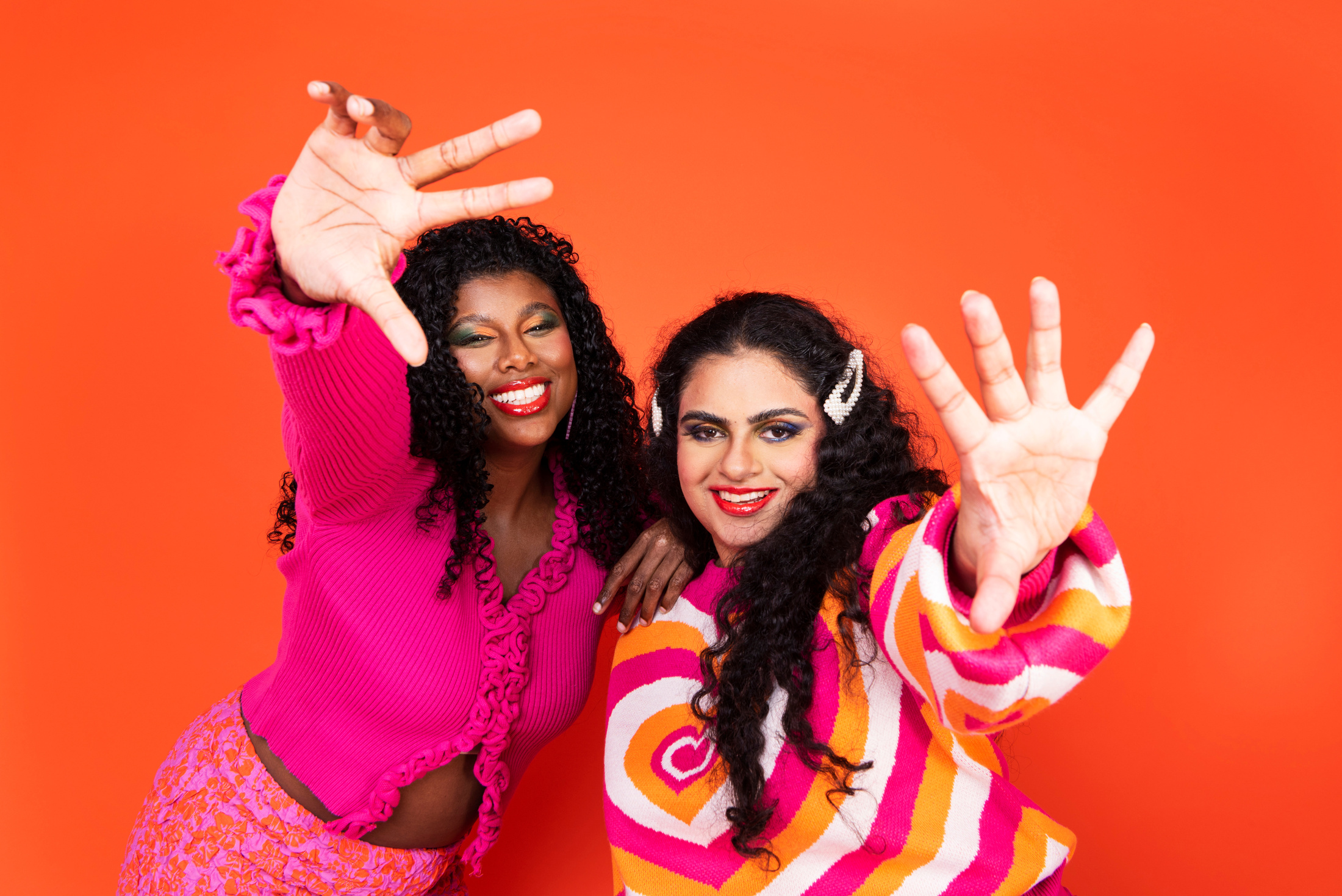 Bright Fashion Portrait of Happy Women in Colorful Outfits